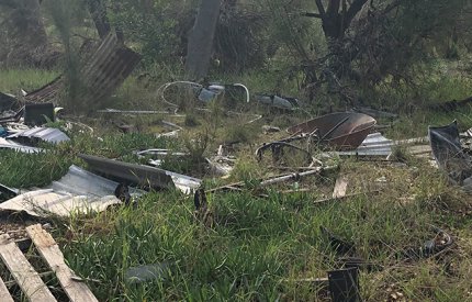Rubbish dumped near bushland